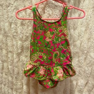 Lilly Pulitzer infant bathing suit.